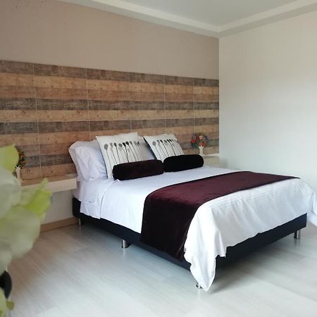 Apartasuite Laureles Cmc เมเดยิน ภายนอก รูปภาพ
